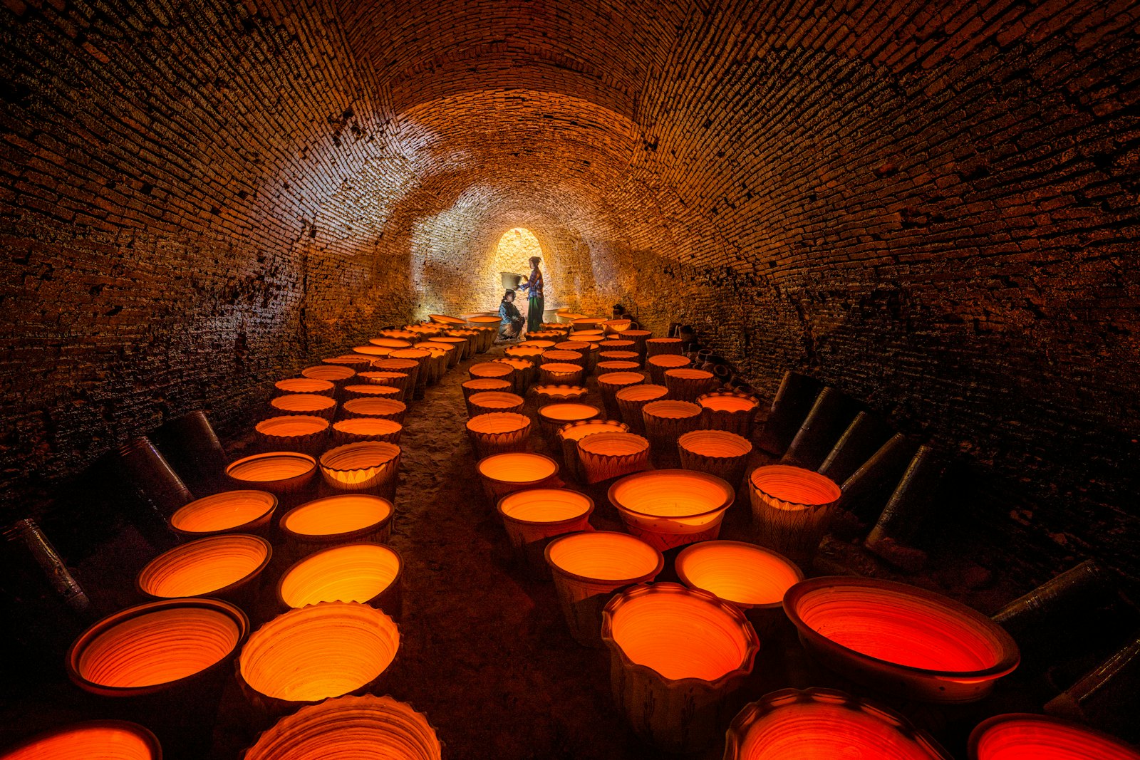 Collection of finished pottery pieces after a completed kiln firing cycle